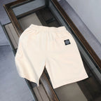 Stone Island off-white shorts with small front emblem patch