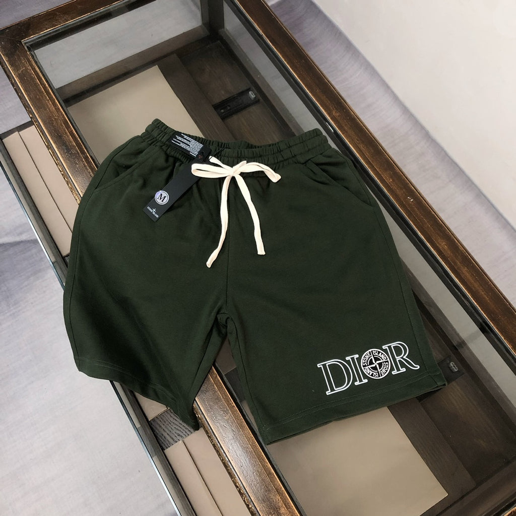 Dark green drawstring shorts with 'DIOR' logo and front pockets