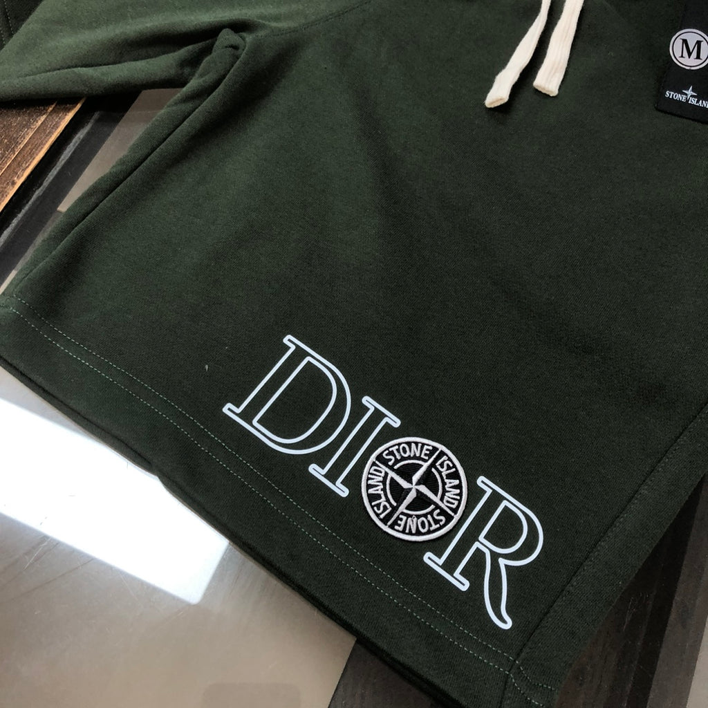 Dark green shorts hem with large 'DIOR' print logo and stitched detail