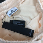 Stone Island off-white shorts interior view with care labels and tags
