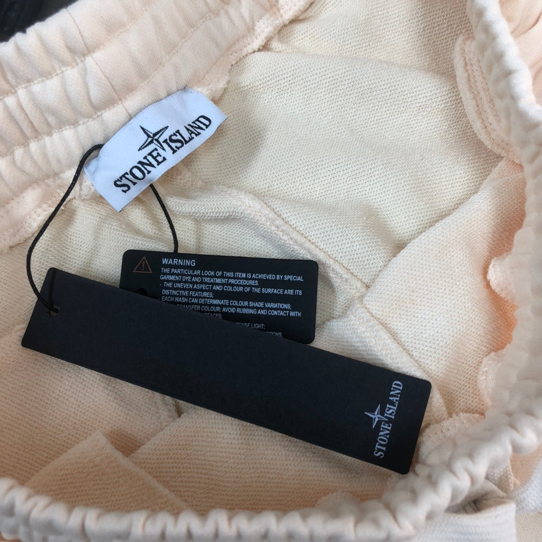 Stone Island off-white shorts interior view with care labels and tags