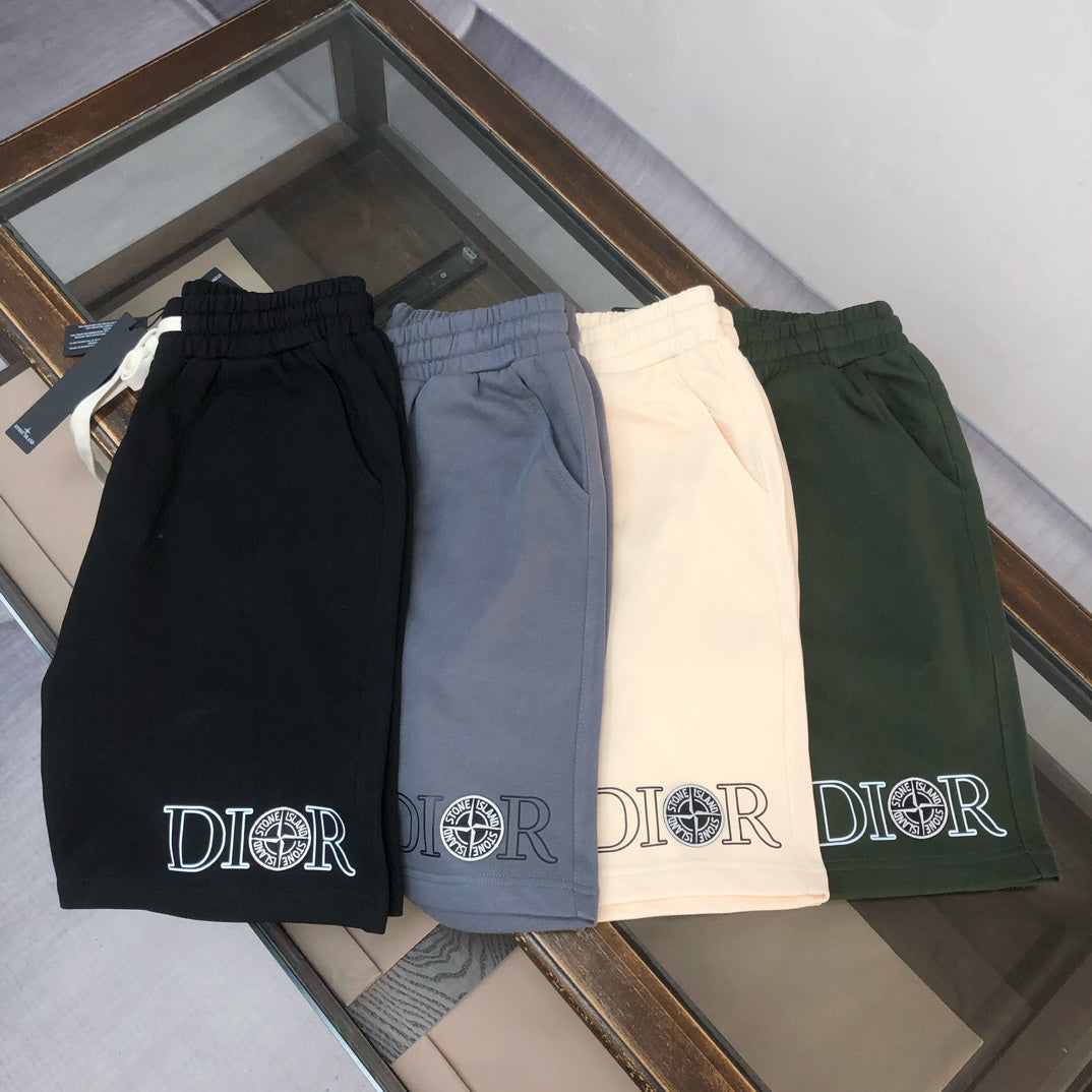 Stone Island logo shorts in black, blue, off-white, and dark green