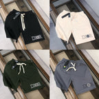 Assorted drawstring shorts in black, white, green, and navy with 'DIOR' logo