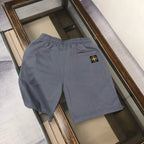 Stone Island dark gray shorts with elastic waist and small chest patch on the side