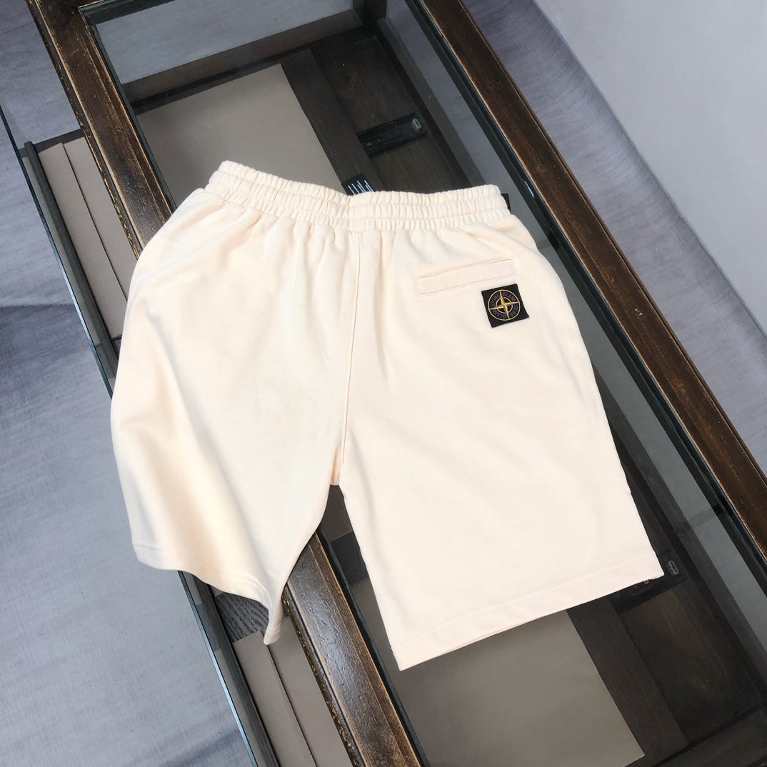 White Stone Island logo shorts with elastic waist and small side logo emblem