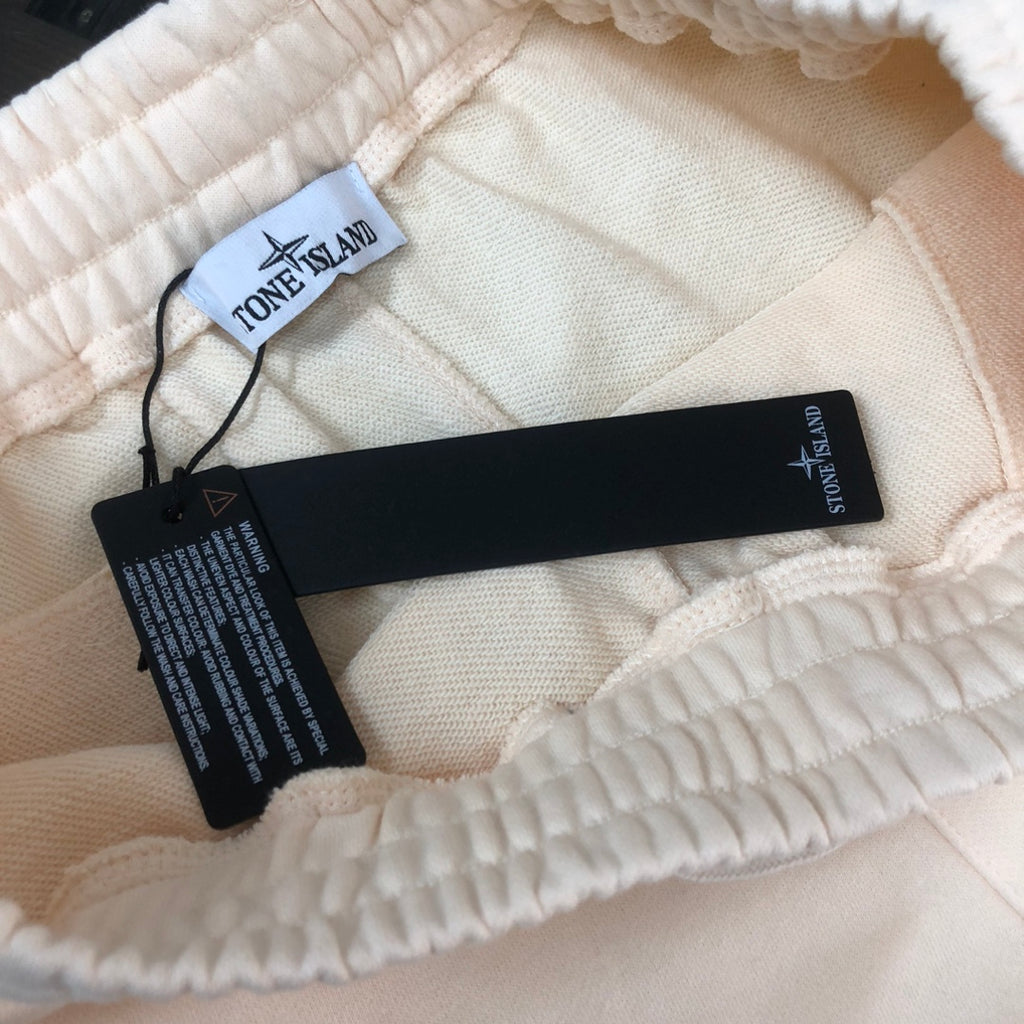 Cream Stone Island shorts interior waistband with care tags on drawstring area