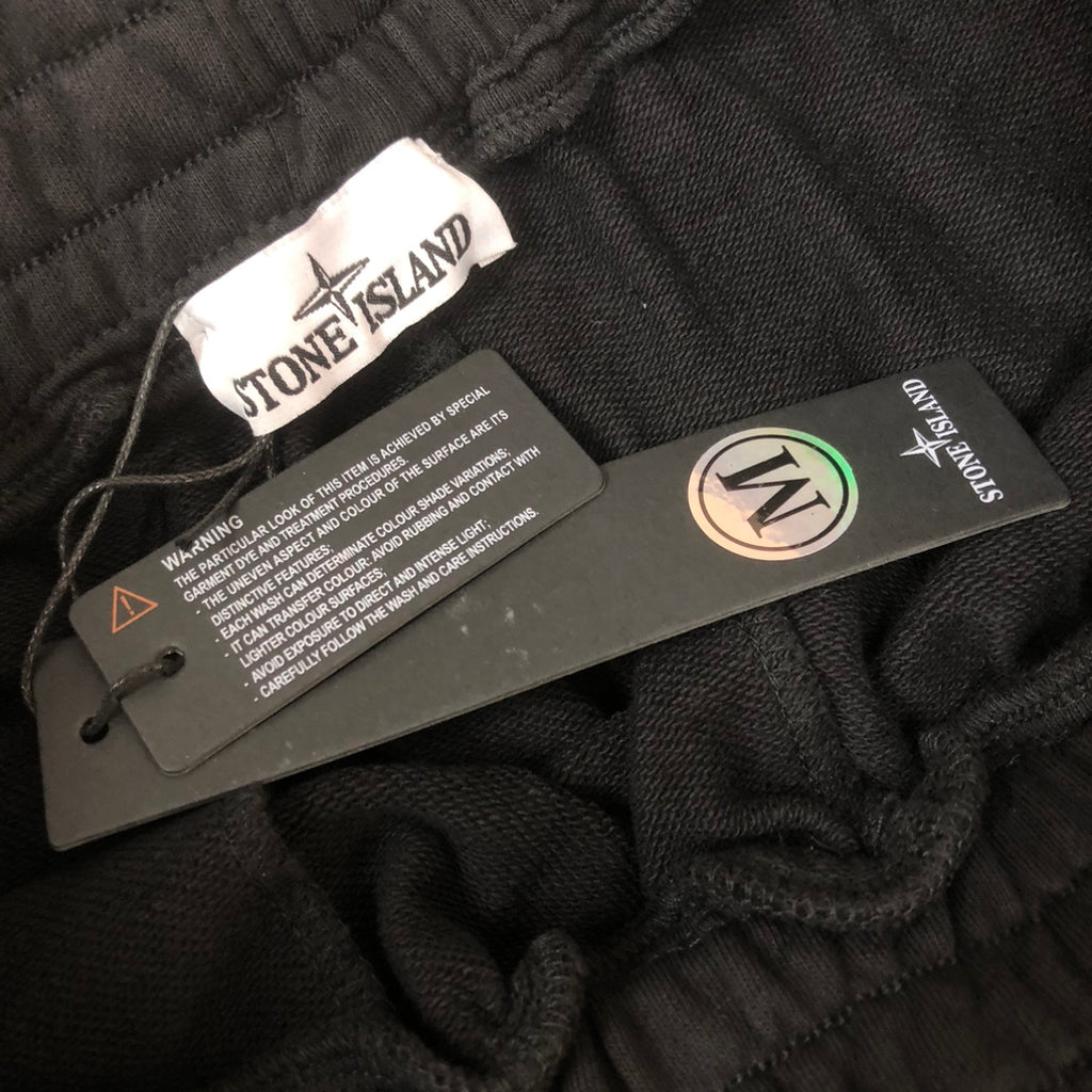 Stone Island black shorts with care label and size tag inside waistband