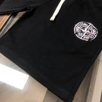 Stone Island black shorts with visible hem stitching and fabric texture