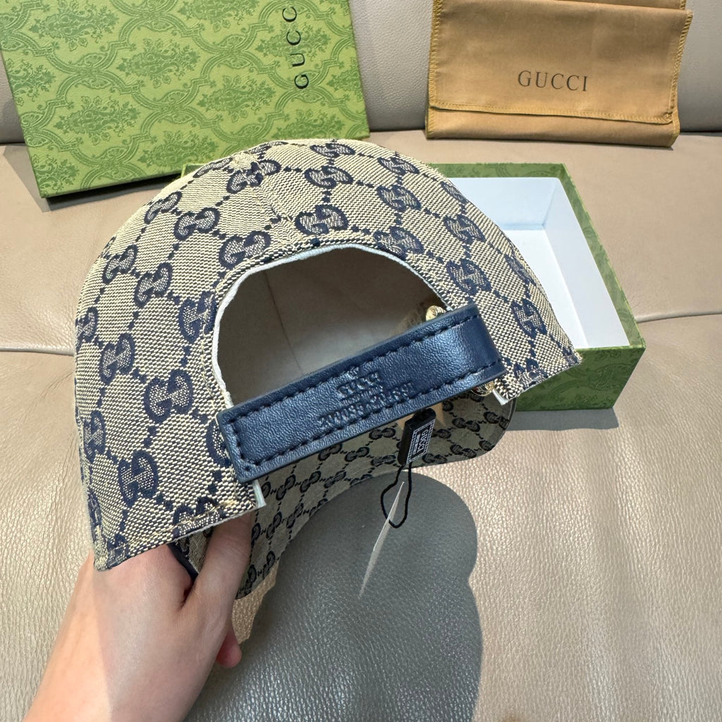 GG-pattern baseball cap underside with adjustable strap and blue trim