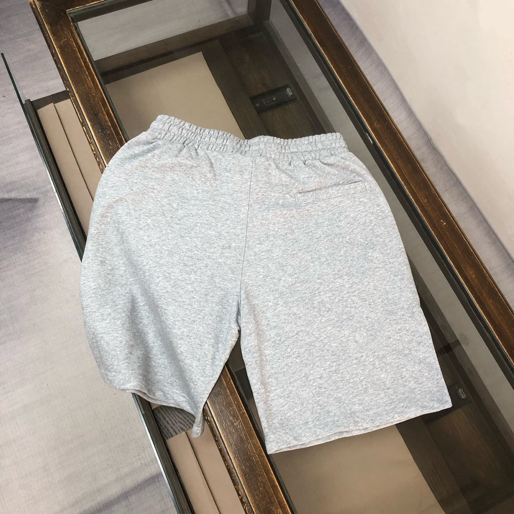 Stone Island shorts, light gray, elastic waist and drawstring; full back view