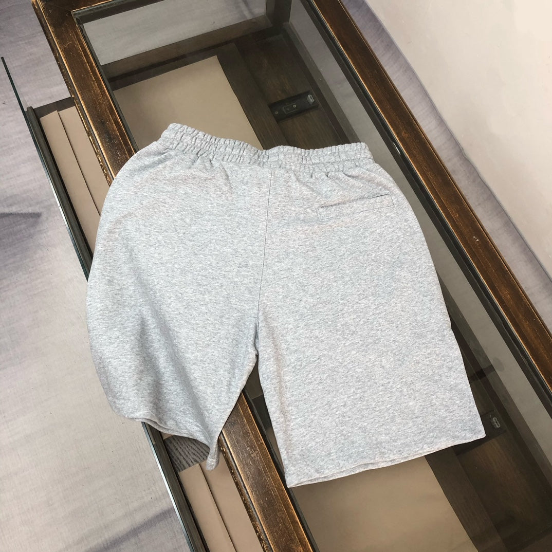 Stone Island shorts, light gray, elastic waist and drawstring; full back view