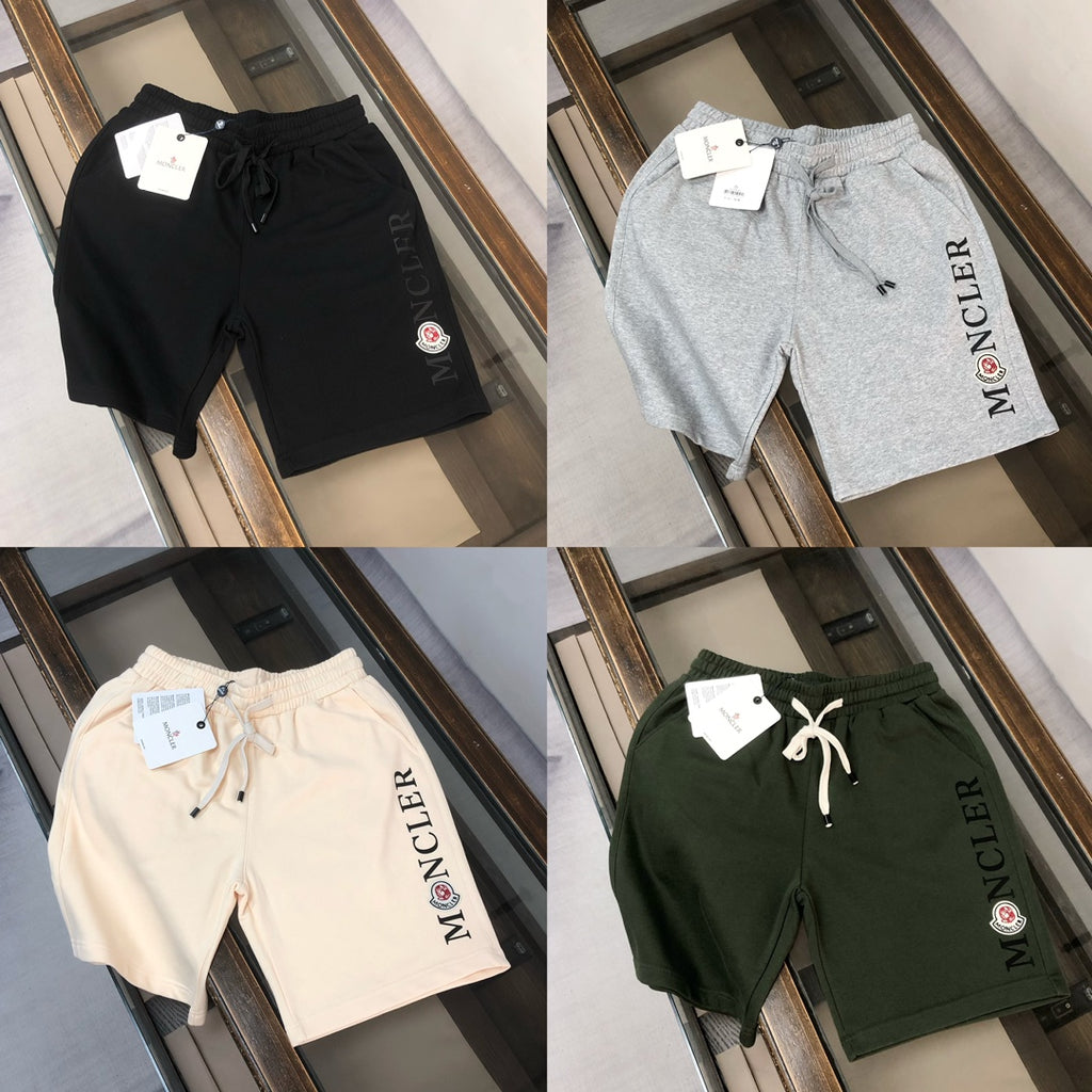 Stone Island shorts set: black, light gray, off-white, and dark green with drawstring