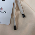 Stone Island cream shorts drawstring ends with Moncler tag labels