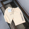Stone Island shorts in cream with drawstring waist and large Moncler logo print