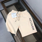 Stone Island shorts in cream with drawstring waist and large Moncler logo print