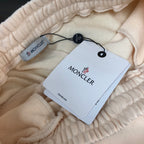 Moncler inner waistband with fabric label and price tag attached