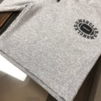 Gray shorts detail with Moncler round logo patch at side hem