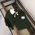 Stone Island shorts in dark green with white drawstring and circular logo patch