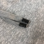 Gray shorts with Moncler label tabs on the inside waistband