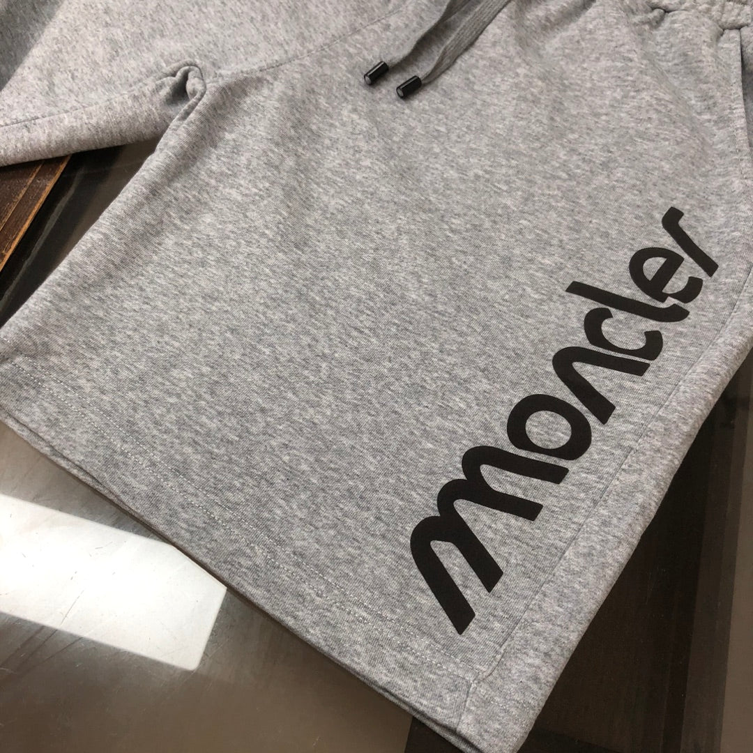 Gray sweat shorts with Moncler logo print and drawstring detail