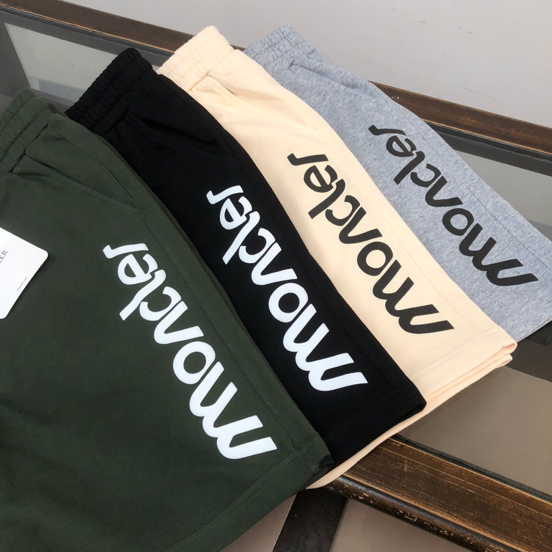 Stone Island drawstring shorts variety: black, cream and dark green with Moncler logo