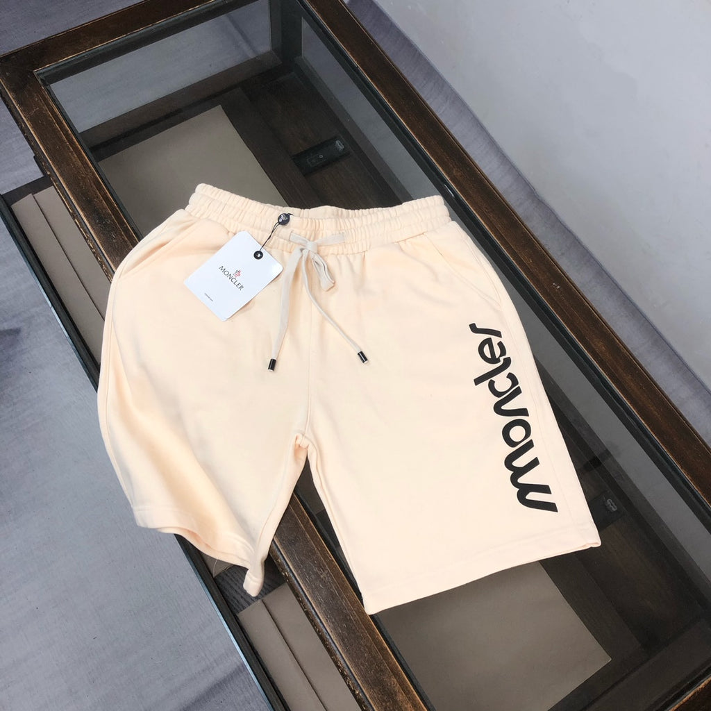 Stone Island drawstring shorts, cream with black Moncler logo and side pockets
