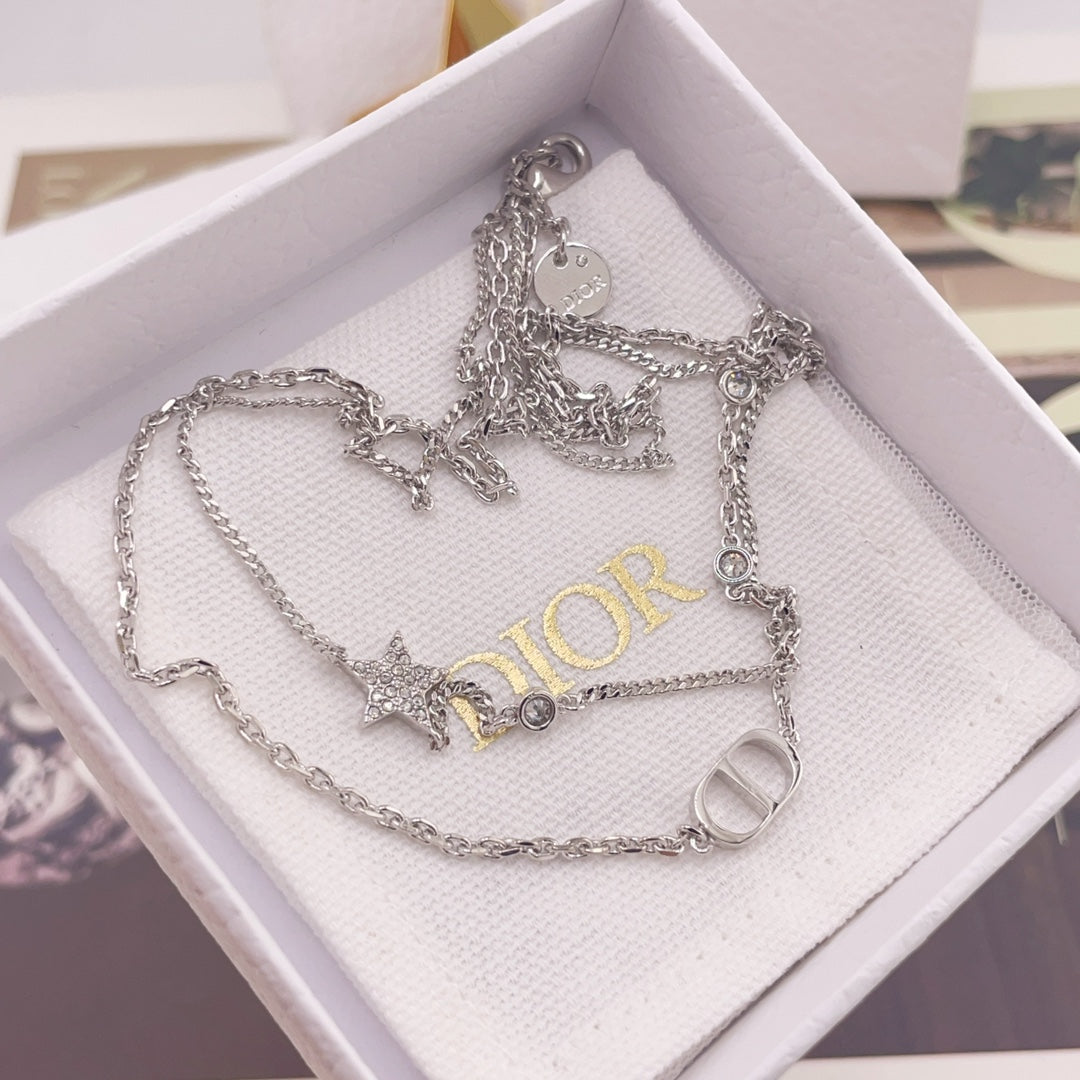 Silver-tone necklace set with star and CD ring charms in white jewelry box