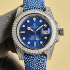 Rolex Submariner watch with blue dial, blue textured strap, diamond-studded bezel