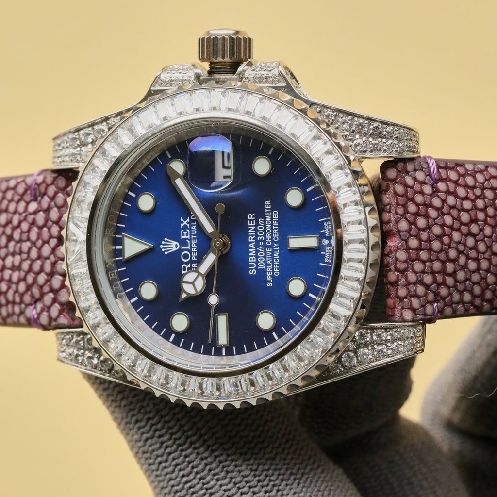 Rolex Submariner wristwatch with blue dial, jeweled bezel, purple textured leather strap
