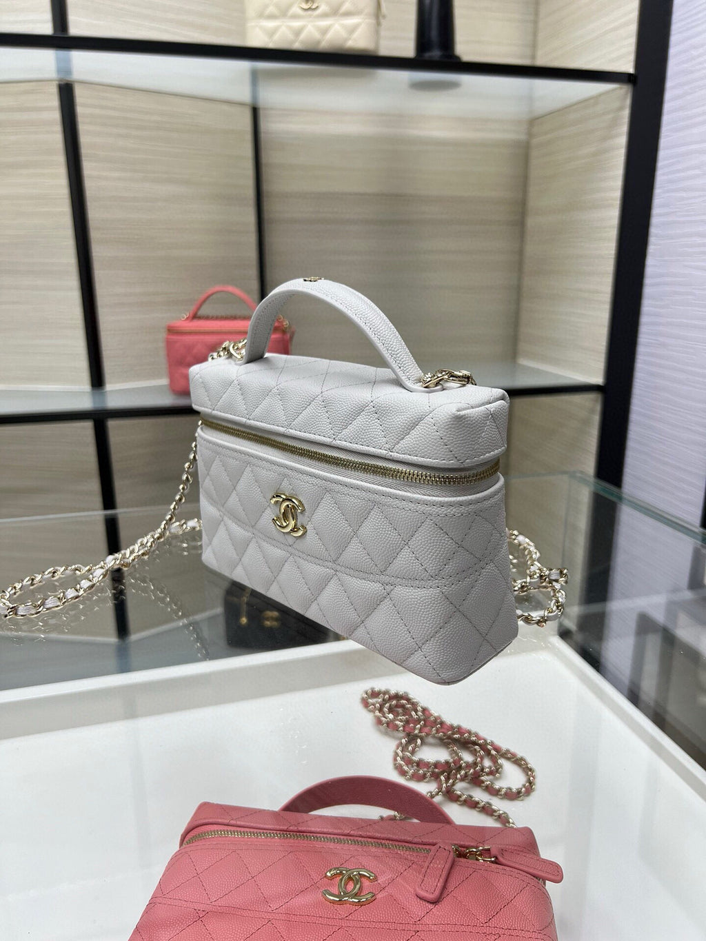 Chanel quilted top-handle bag with chain strap, light gray with gold-tone hardware