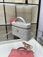 Chanel quilted top-handle bag with chain strap, light gray with gold-tone hardware