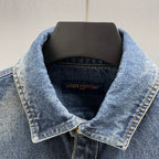 Denim jacket collar with Louis Vuitton label inside neckline