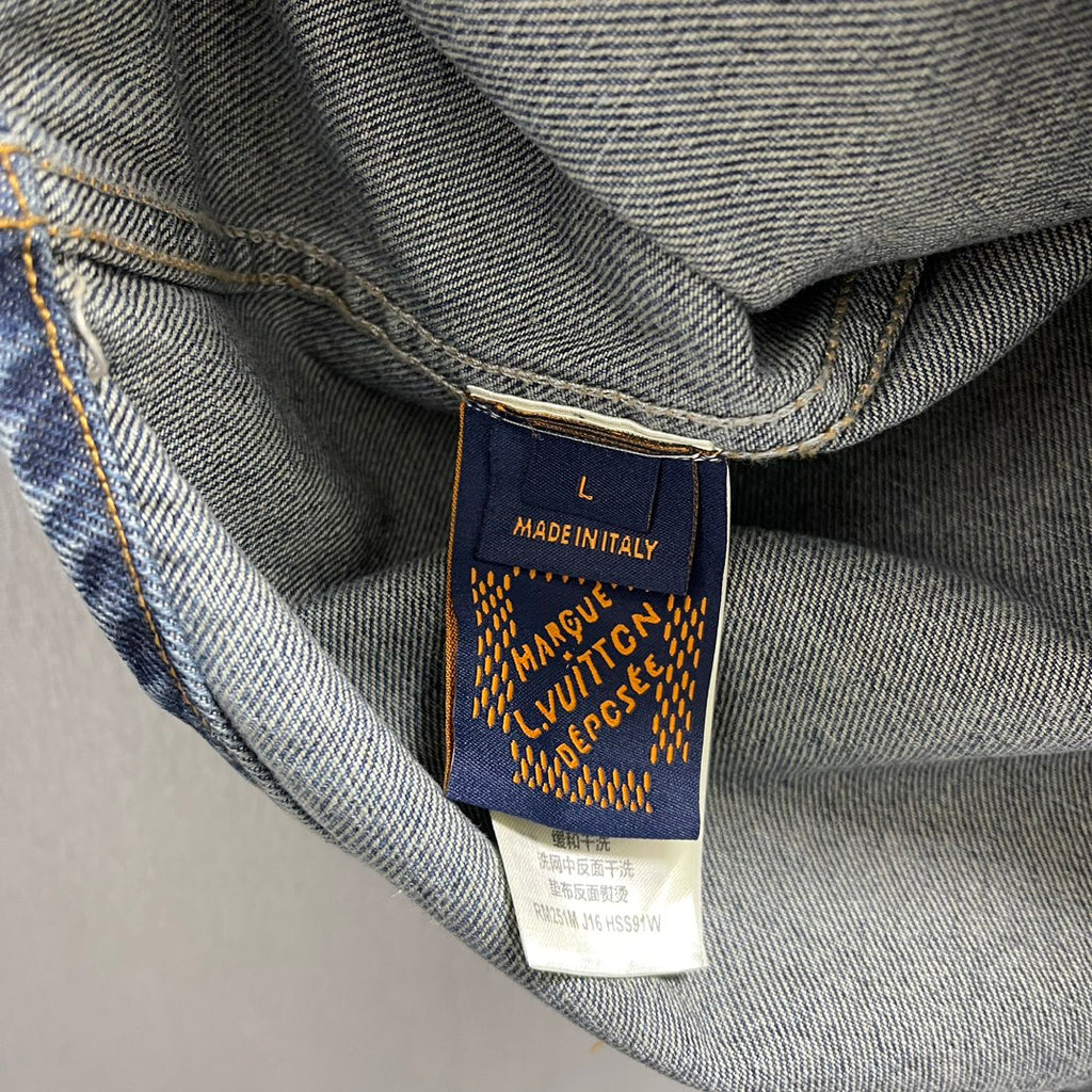 Denim jacket size tag showing L and Made in Italy