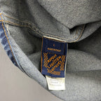 Denim jacket size tag showing L and Made in Italy