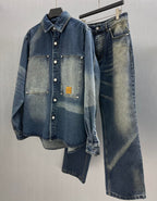 Denim jacket and jeans set with button-up top, flap pockets, and matching pants