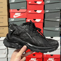 Black Balenciaga running shoe with black laces and sculpted rubber sole