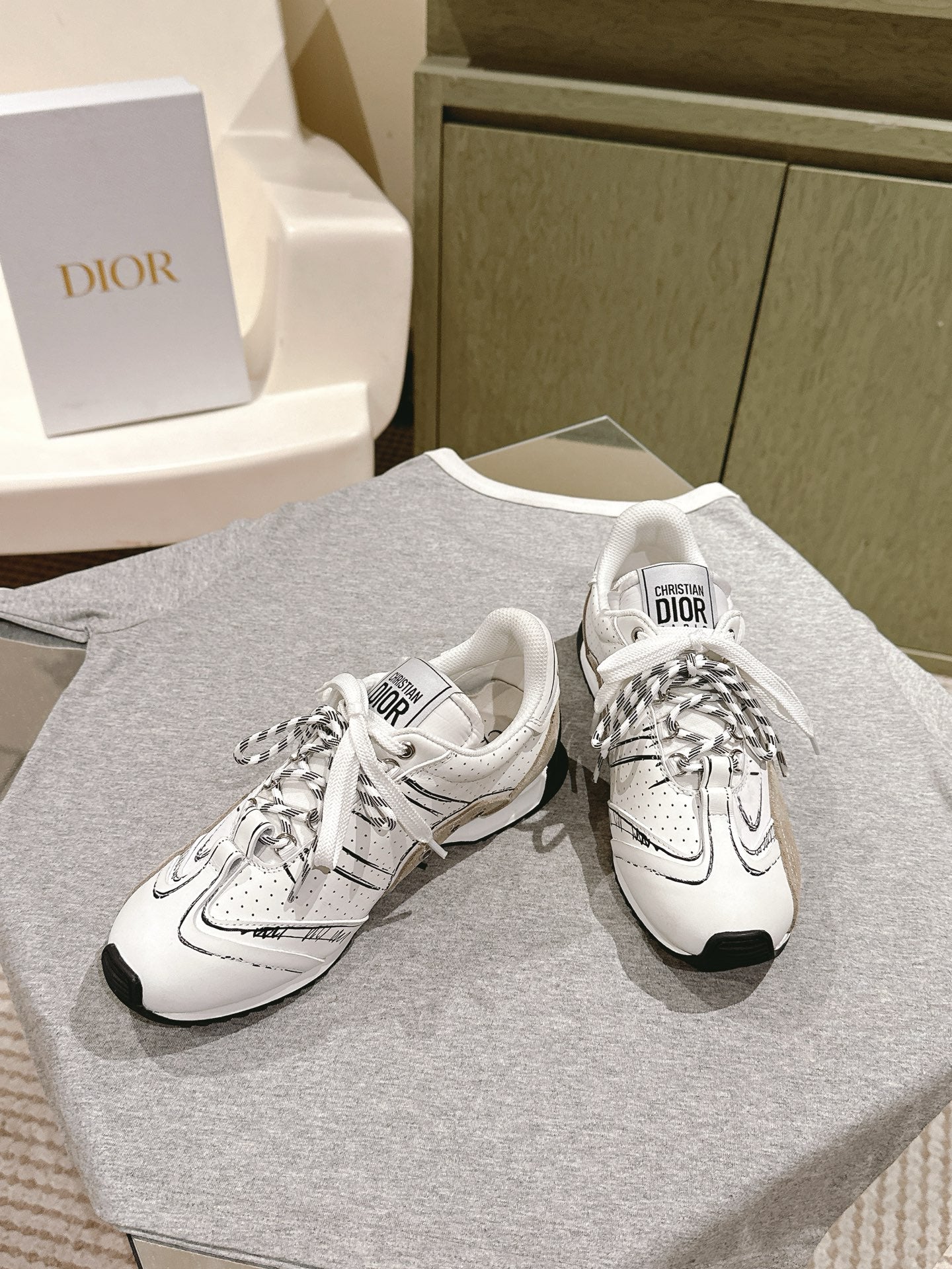 Dior unisex sneakers, white lace-up design with black heel accents