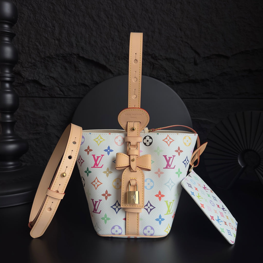 Louis Vuitton monogram bucket bag with tan strap and colorful multicolor logo pattern