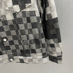 Checkered denim jacket with button cuffs and front pocket panel