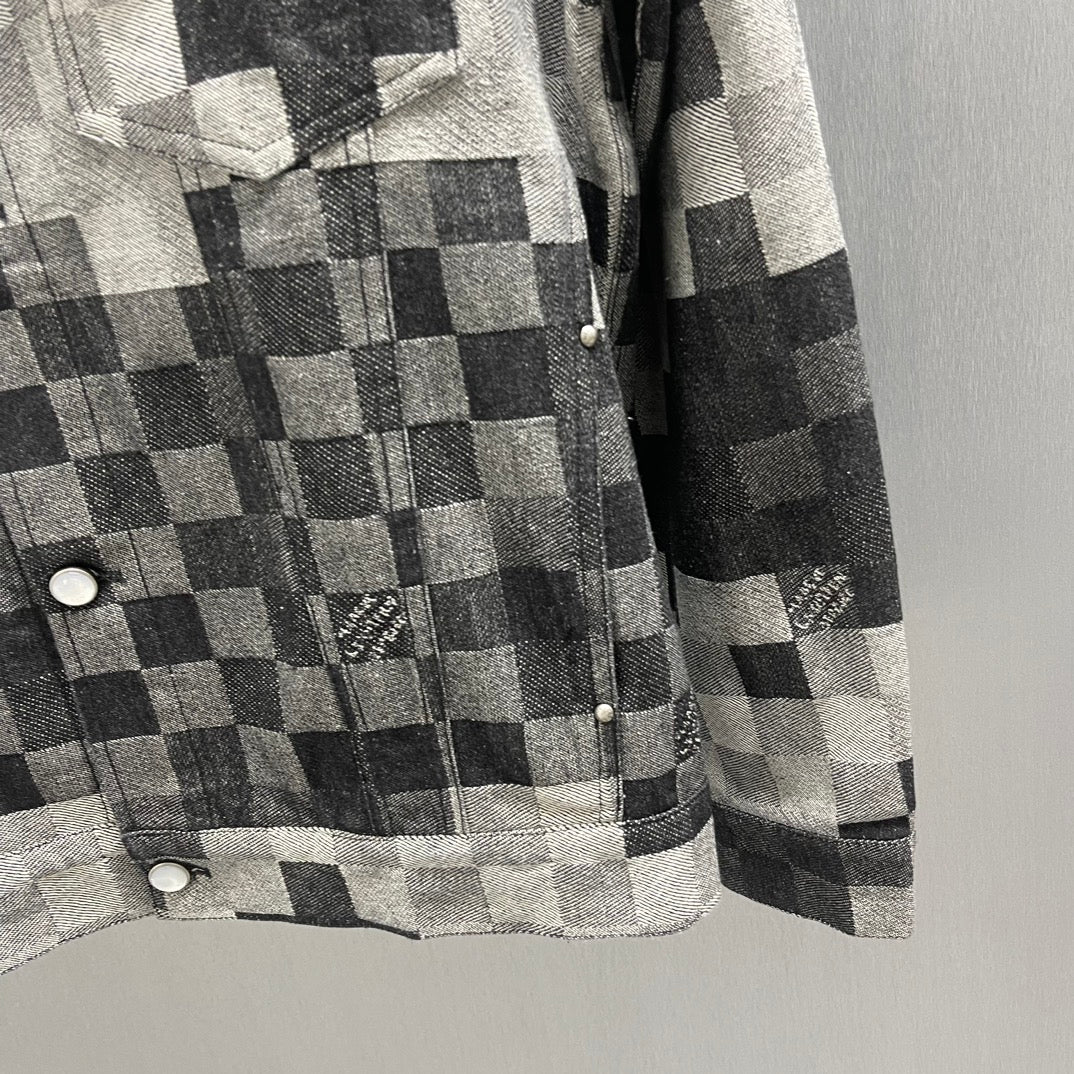 Checkered denim jacket with button cuffs and front pocket panel