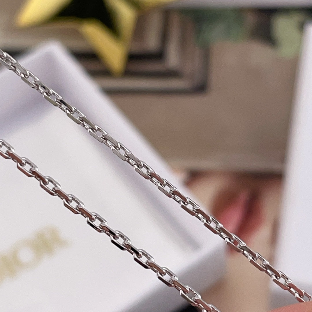 Dior necklace chain links in silver tone, close-up