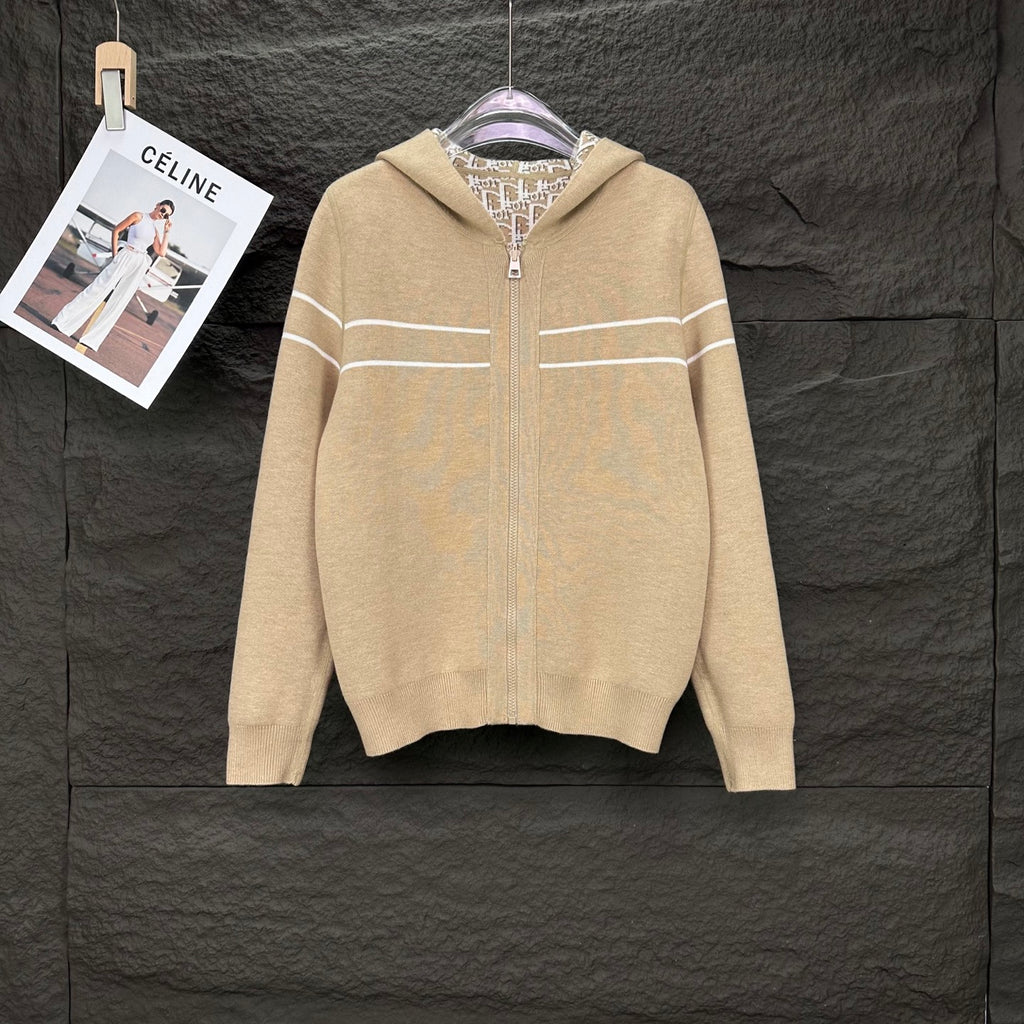 Beige long-sleeve zip hoodie with striped detail across chest and hood