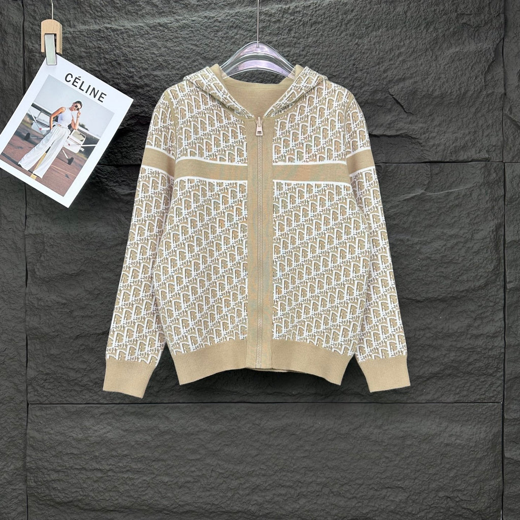 Beige knit hooded zip jacket with allover white monogram pattern, long sleeves