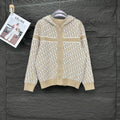 Beige knit hooded zip jacket with allover white monogram pattern, long sleeves