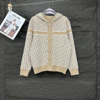 Beige knit hooded zip jacket with allover white monogram pattern, long sleeves