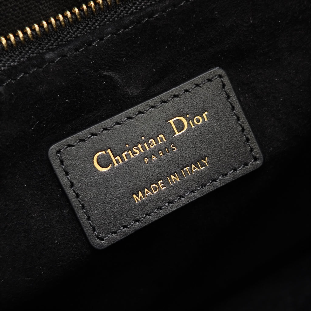 Black interior label reading "Christian Dior" and "Made in Italy"
