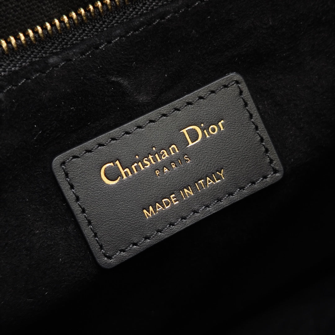 Black interior label reading "Christian Dior" and "Made in Italy"