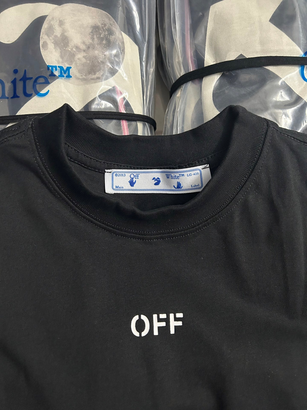 Black Off-White crewneck T-shirt close-up with OFF logo