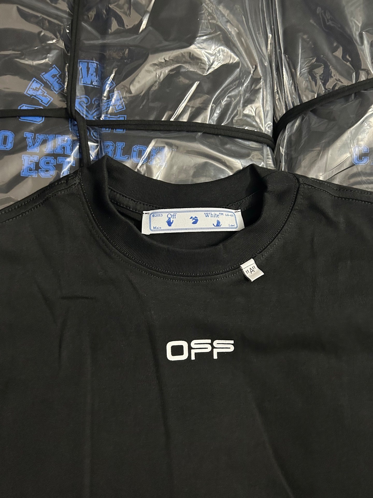 Black Off-White T-shirt chest view with OFF logo and neck tag