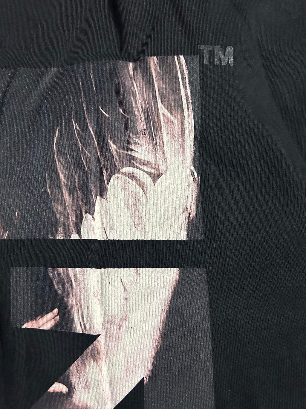 Black Off-White T-shirt with high-contrast portrait panel graphic